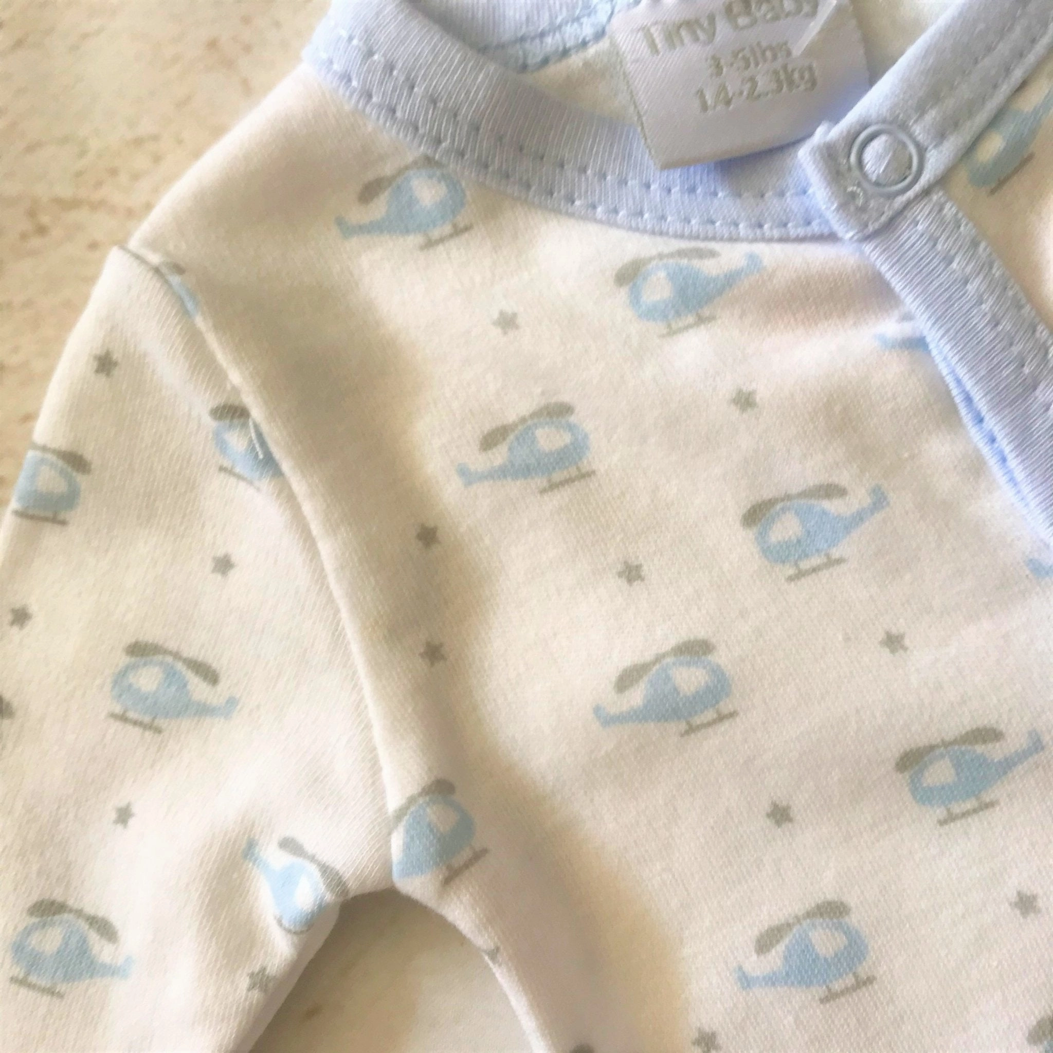 Cute Little One White with Blue Helicopter Print Sleepsuit