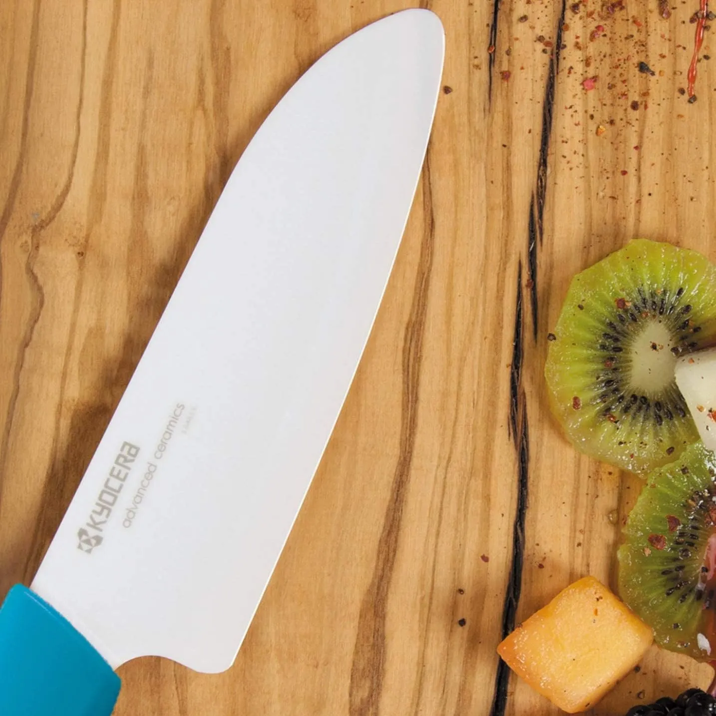 Kyocera’s Revolution Series 5.5” Ceramic Santoku Knife, Chef Knife For Your Cooking Needs, Blue Handle, White Blade